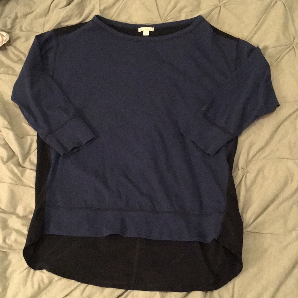 Navel blue top with black sheer back